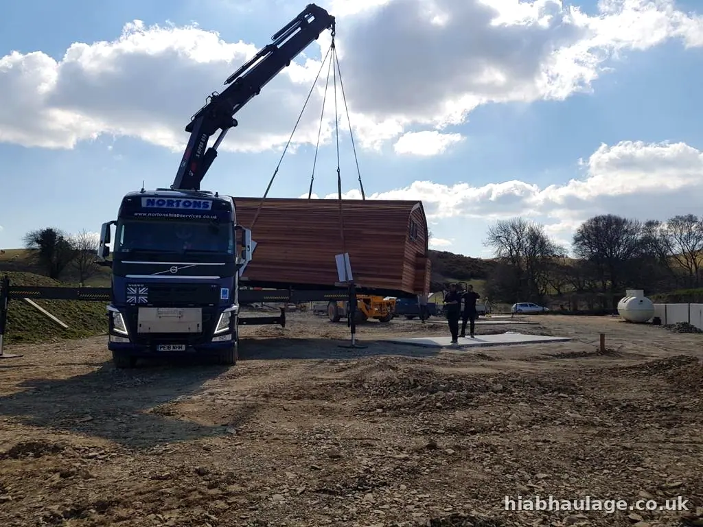 Glamping pod being lowered onto its concrete base Glamping pod being lowered onto its concrete base