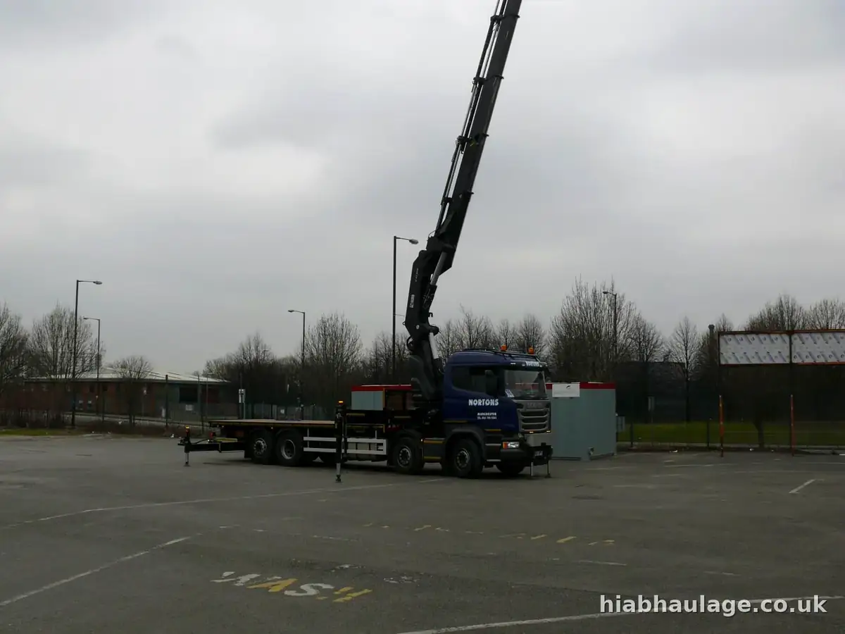 Rigid HIAB with its boom raised to full vertical reach Rigid HIAB with its boom raised to full vertical reach