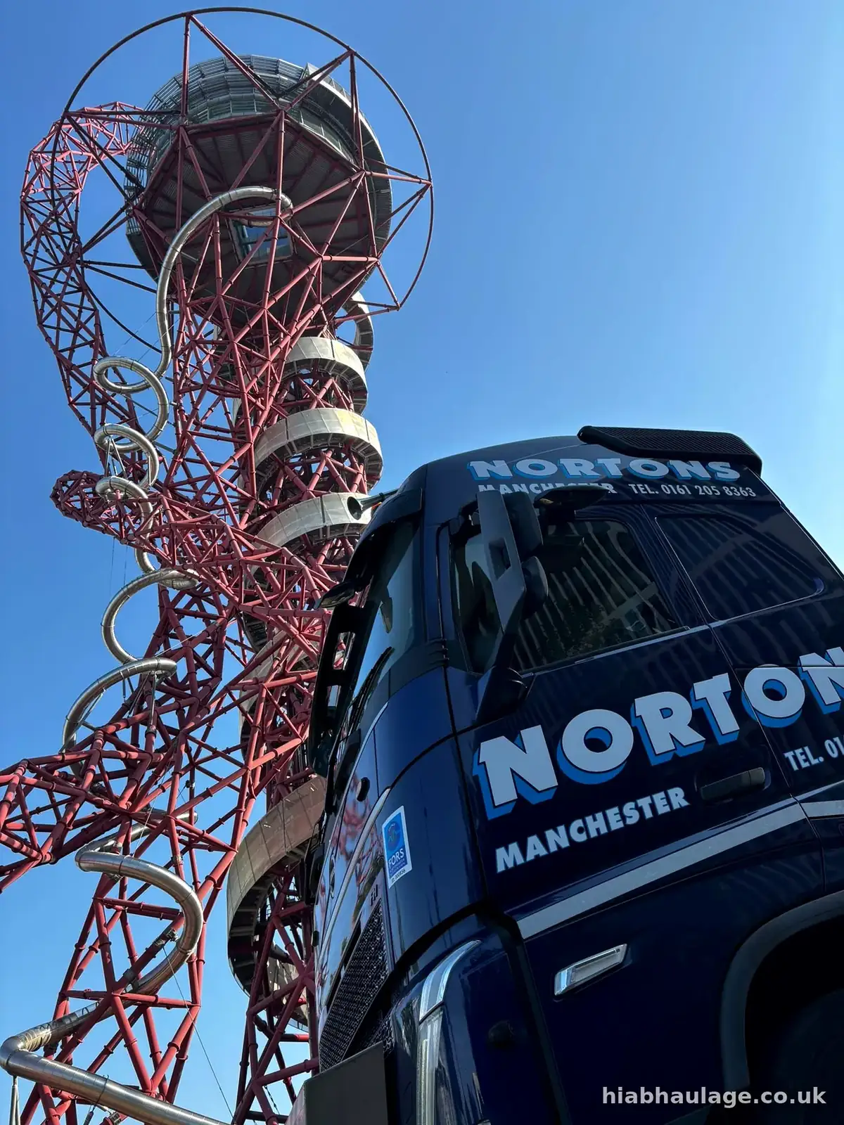 HIAB cab beside the red lattice tower at the Olympic Park in London HIAB cab beside the red lattice tower at the Olympic Park in London