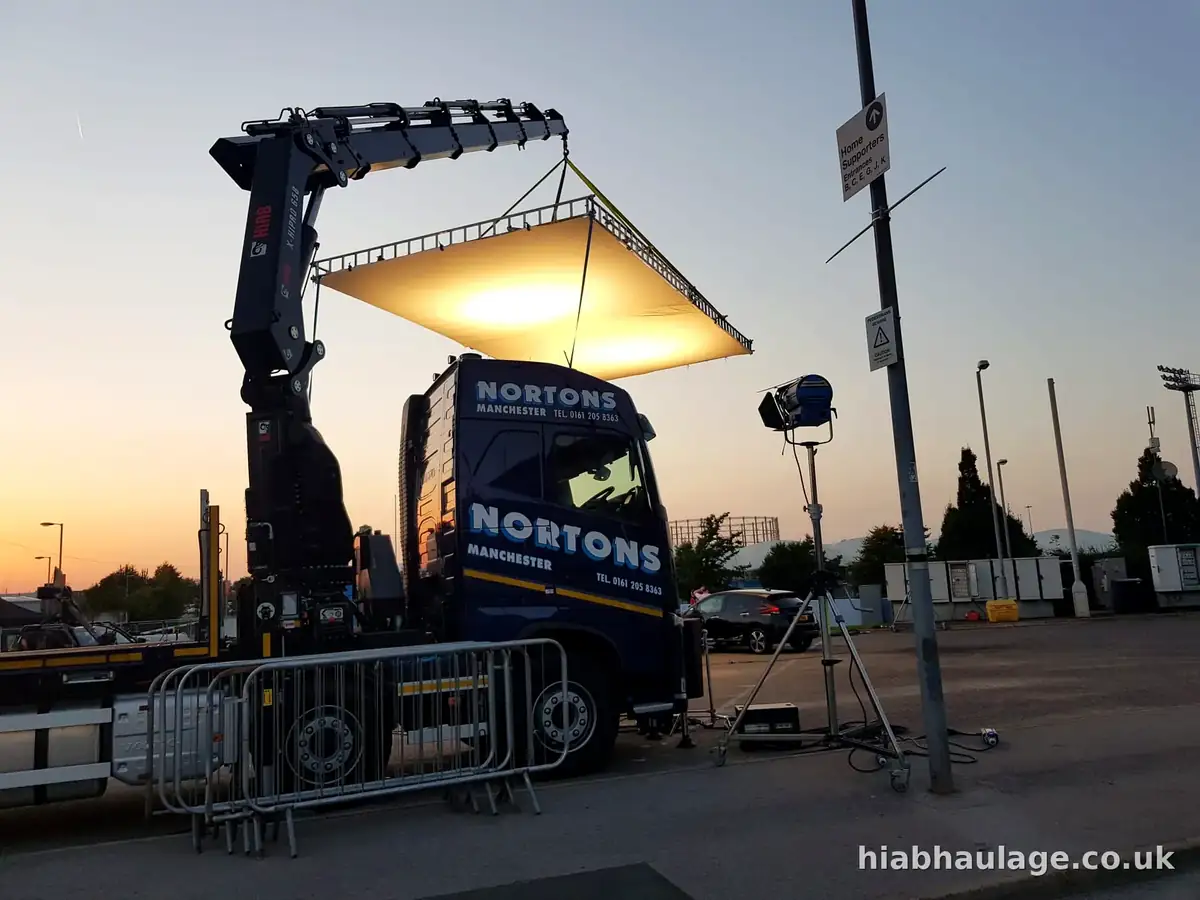 HIAB holding a lighting rig over a film set