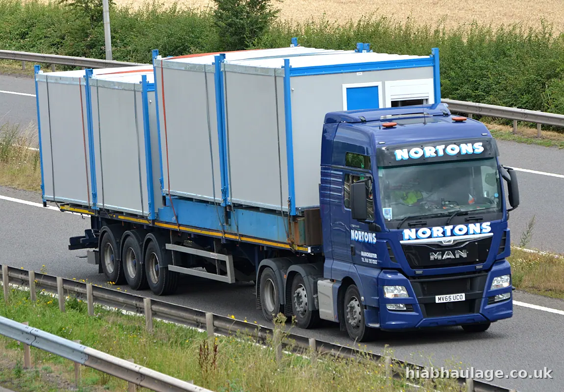 MAN artic carrying site cabins on the M5 in Worcestershire