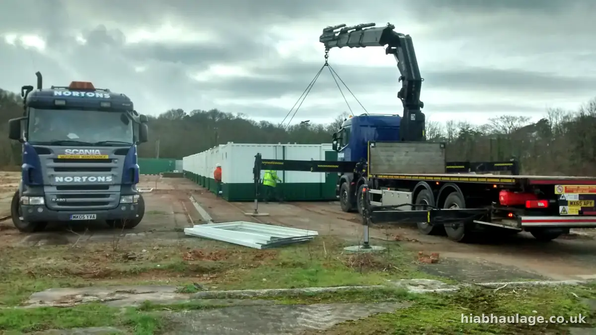 Rigid HIAB setting a cabin into place in Wales Rigid HIAB setting a cabin into place in Wales