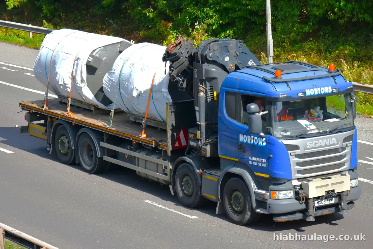 Rigid HIAB carrying drums on the A38