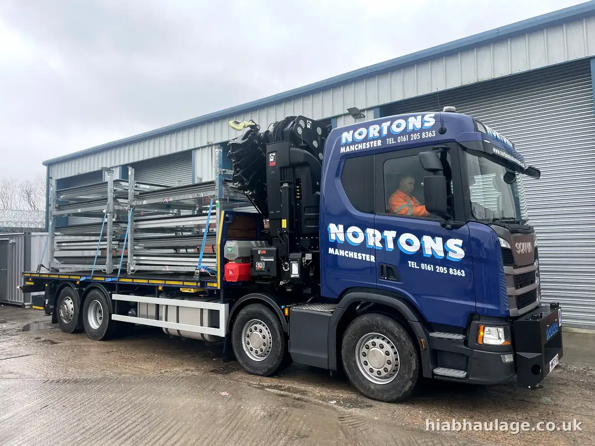 Rigid HIAB with steel stillages, side view Rigid HIAB with steel stillages, side view