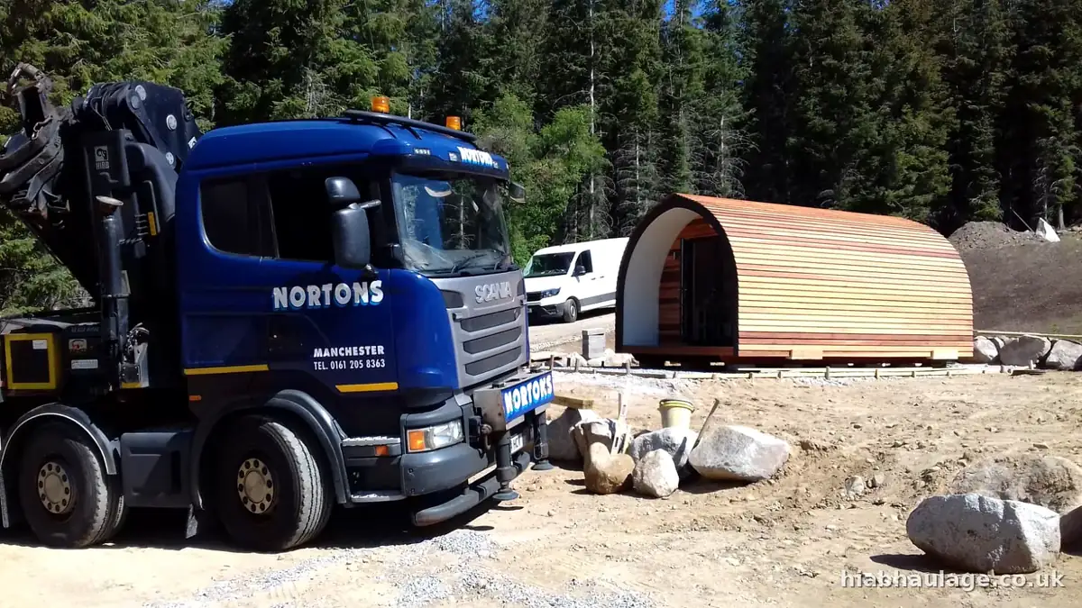 Scania HIAB and glamping pod on site Scania HIAB and glamping pod on site