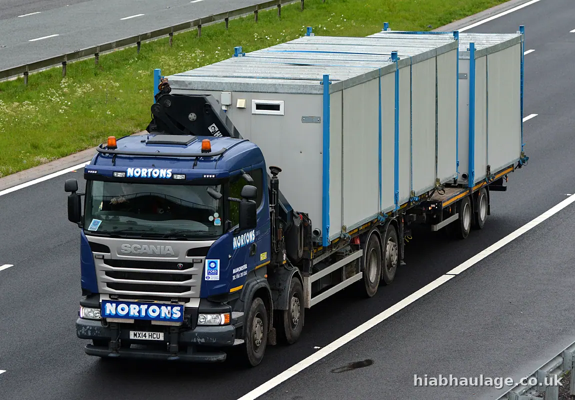 Scania wagon and drag carrying cabins on the M6 in Cumbria