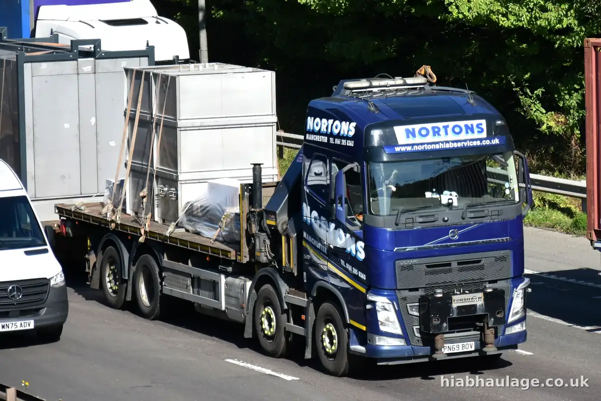 Volvo HIAB carrying steel units on a motorway Volvo HIAB carrying steel units on a motorway