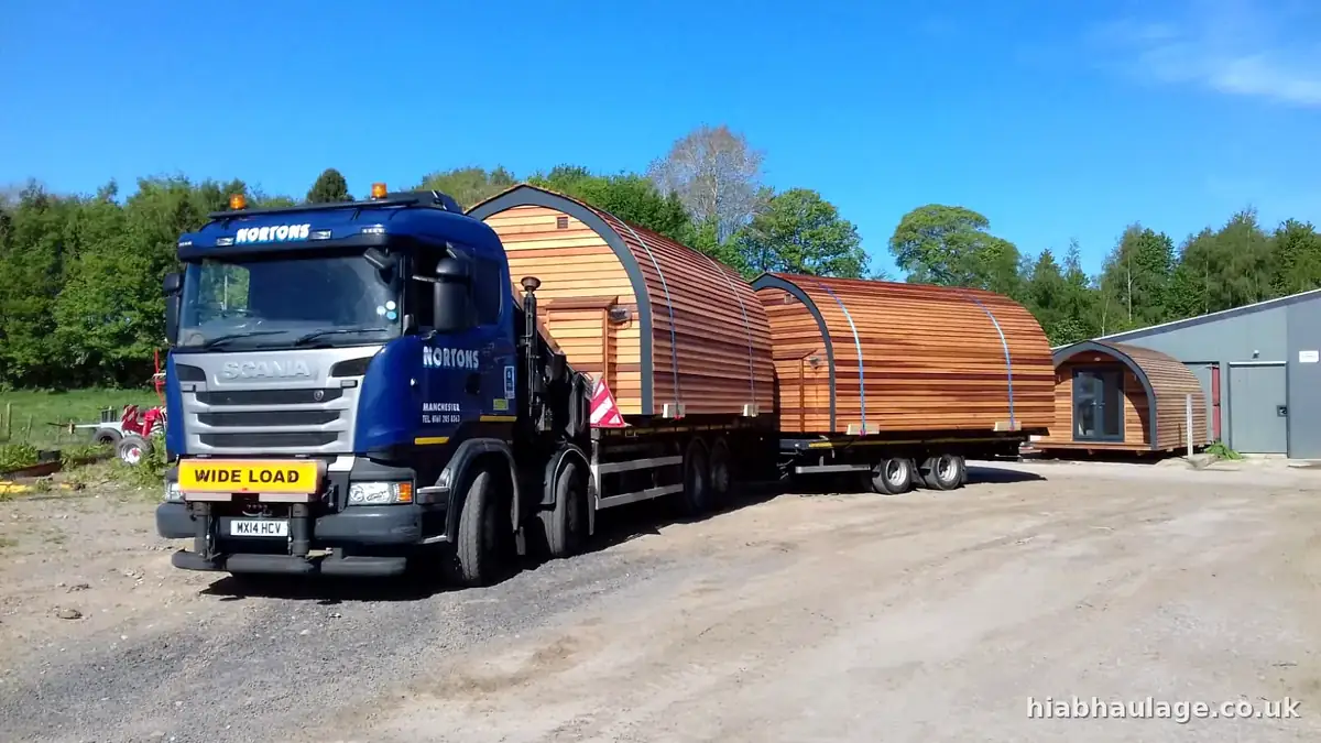 Wagon and drag loaded with timber pods Wagon and drag loaded with timber pods